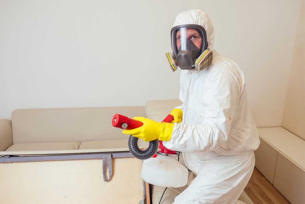 pest control worker in uniform spraying pesticides 2022 05 12 00 49 40 utc 1